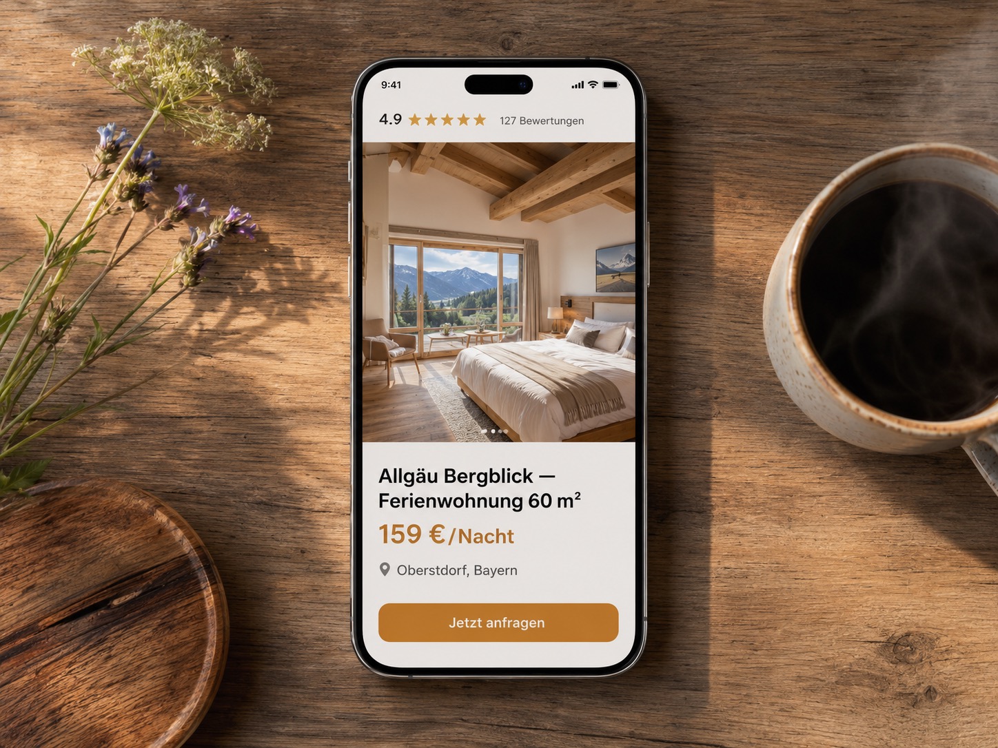 Smartphone zeigt eine Favorent Ferienwohnung im Allgäu zur Buchung an.